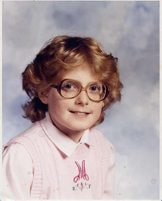 Illustration for article titled Goofy Glasses, Pretty Pigtails & Snaggletooth Smiles: September Is For School Portraits